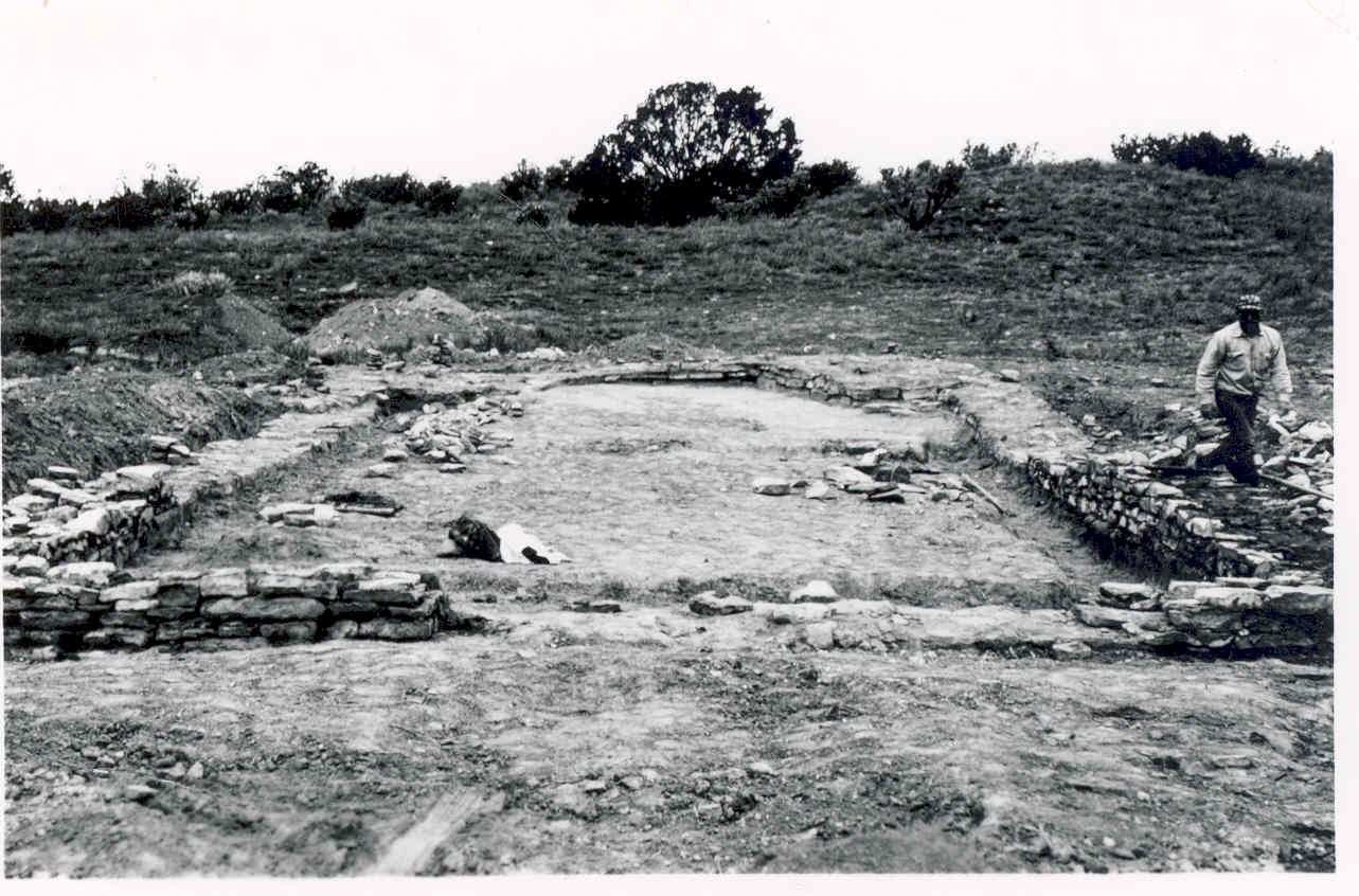 An early crew works to stabilize the foundations of an early church for the community of Manzano.