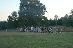 Line of American soldiers marching across a field
