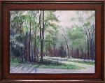 Impressionistic view of road winding through trees