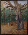 Solitary stone marker beneath an old tree