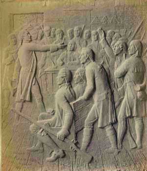 Bronze plaque portraying a town meeting during the time of Colonial America.