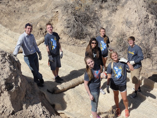 High school group working on erosion control