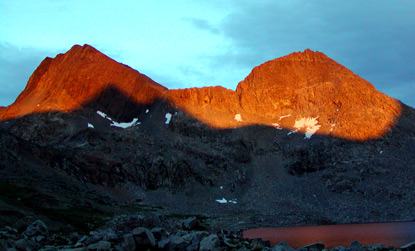 Alpenglow on peaks above Martha Lake in Kings Canyon National Park
