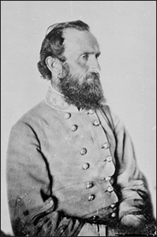 Historic photo of Stonewall Jackson; seated, posed in uniform.