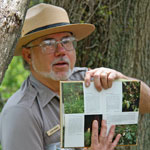 A Ranger shares details about a spring wildflower during a Ranger Program.