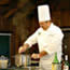 A chef provides culinary tips at an ARAMARK Summer Event