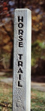 A horse trail sign post marking some of the 180 miles of horse trails in the park.