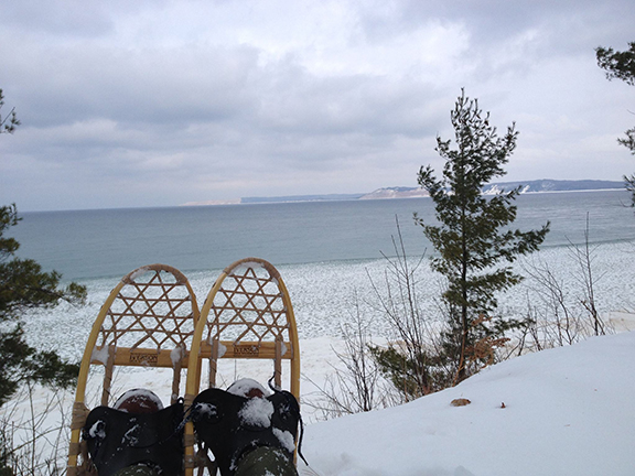 View of Platte Bay in winter with snowshoes in foreground