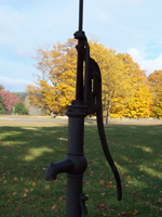 Water hand pump at Port Oneida School