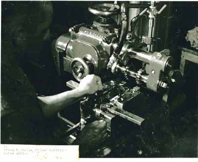 Here may be seen a Brown & Sharpe milling machine with two cutters for 