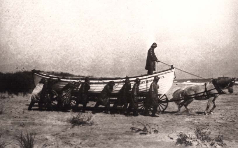 Life Saving Service surf boat being hauled to the water