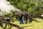 Civil War-era infantry fire muskets in formation at Springfield Armory National Historic Site during Armory Day 2010 