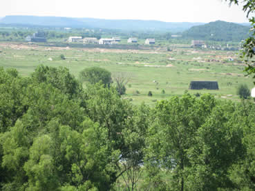 Imagine no buildings and open tallgrass prairie here after the site is restored