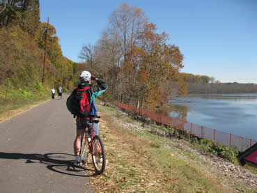 Bicyclist views Mattawoman Creek from Indian Head Rail Trail