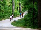 Bikers enjoy the paved trail at Panola Mountain State Park.