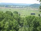 Imagine no buildings and open tallgrass prairie here after the site is restored