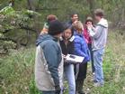 Students use GPS units to document a Tuxedo Park trail-in-the-making