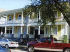 Typical rehabilitated houses of the Thomas Square Streetcar Historic District, with wide front porches and large windows.