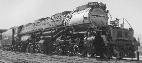 Three quarter view from front right of a large steam locomotive, the Union Pacific 4012 Big Boy built in 1941.