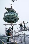 Removal of the Statue's torch in the 1980s