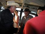 Sec'y Salazar greeting people in crown in 2009