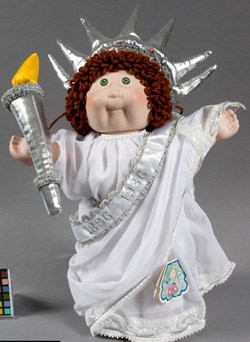 Cabbage Patch doll in white gown and silver crown c. 1986