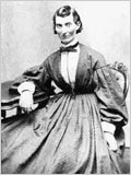 Civil War image of woman sitting at a table.