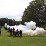 Six cannons firing together.