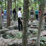 McGavock High School students explore the limestone outcroppings at the Slaughter Pen.