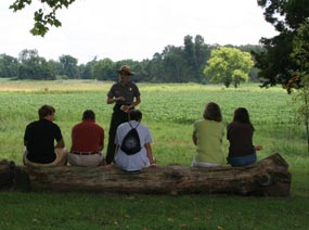 A park ranger talks to visitors at Stones River National Battlefield.
