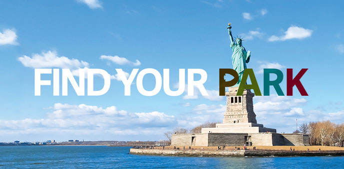 Photo of the Find Your Park logo with the Statue of Liberty in the background