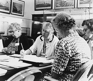 Esther Peterson writing at meeting of Commission on Status of Women Esther Peterson writing at meeting of Commission on Status of Women