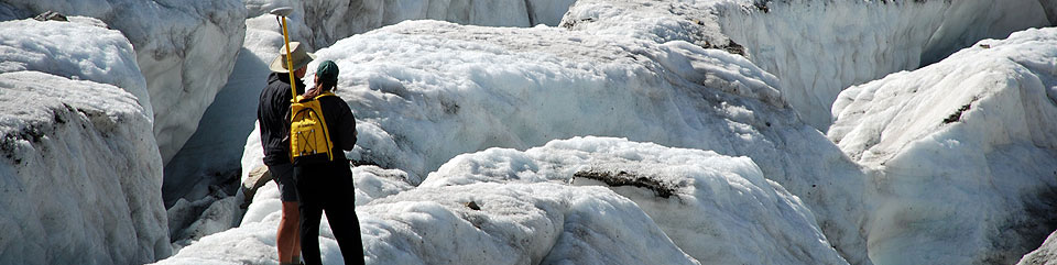 Two scientists on a glacier.