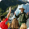 Park Ranger engaging youth at Kenai Fjords Park Ranger engaging youth at Kenai Fjords