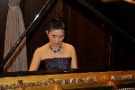 Miho Ebihara playing piano.