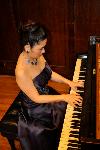 Miho Ebihara playing piano.