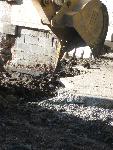 ABF- The excavator digs deep.