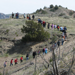 Kids follow a ranger up the Wind Canyon Trail.