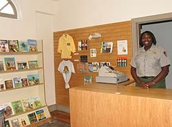 Ranger at visitor center and bookstore desk