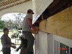 Lifting new sill beam into place