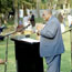 Presenting speaking at the slave quarters.