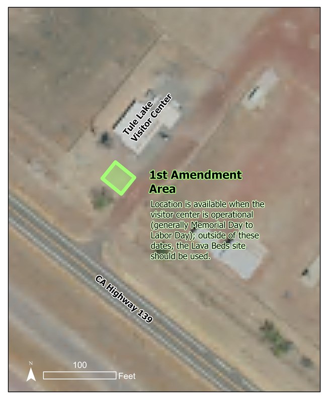Aerial image of visitor center and parking lot, with the 1st amendment zone highlighted