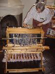 Volunteer Ellen Dorosh preparing to weave