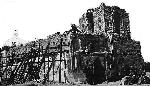 Building a roof on the old mission ruin
