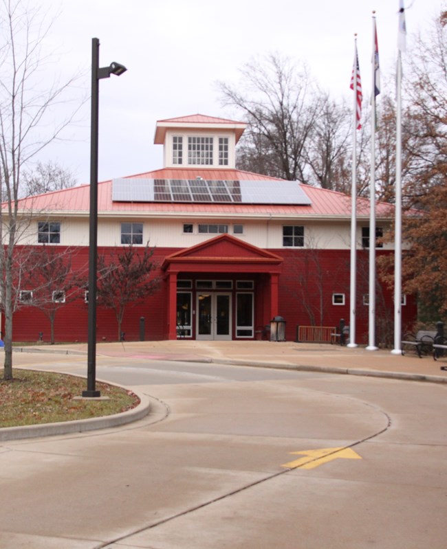 Photograph of Ulysses S. Grant NHS visitor center with solar panels on the roof.