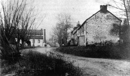 Fig. 3. Old mill and tenant houses in Valley Forge. After the Revolution, Valley Forge resumed its role as an industrial community. This photograph most likely dates from the late nineteenth century, when Valley Forge suffered economic decline.