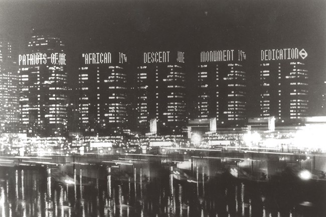 black and white photograph, buildings, lights, river, philadelphia