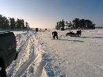 Checking ice thickness in Black Bay