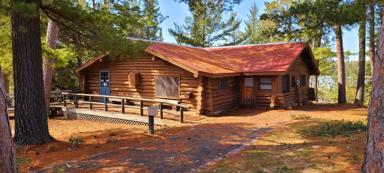Historic Meadwood Lodge now serves as Ash River Visitor Center Ash River Visitor Center, formerly Meadwood Lodge, an old log constructed design, sits among towering pines above the shoreline of Kabetogama Lake