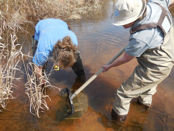 Kim Shaw, Blue Thumb Quality Assurance Officer (left) and-Beckey Smith, former Teacher Ranger Teacher, collected creek bugs in the Washita River last March.